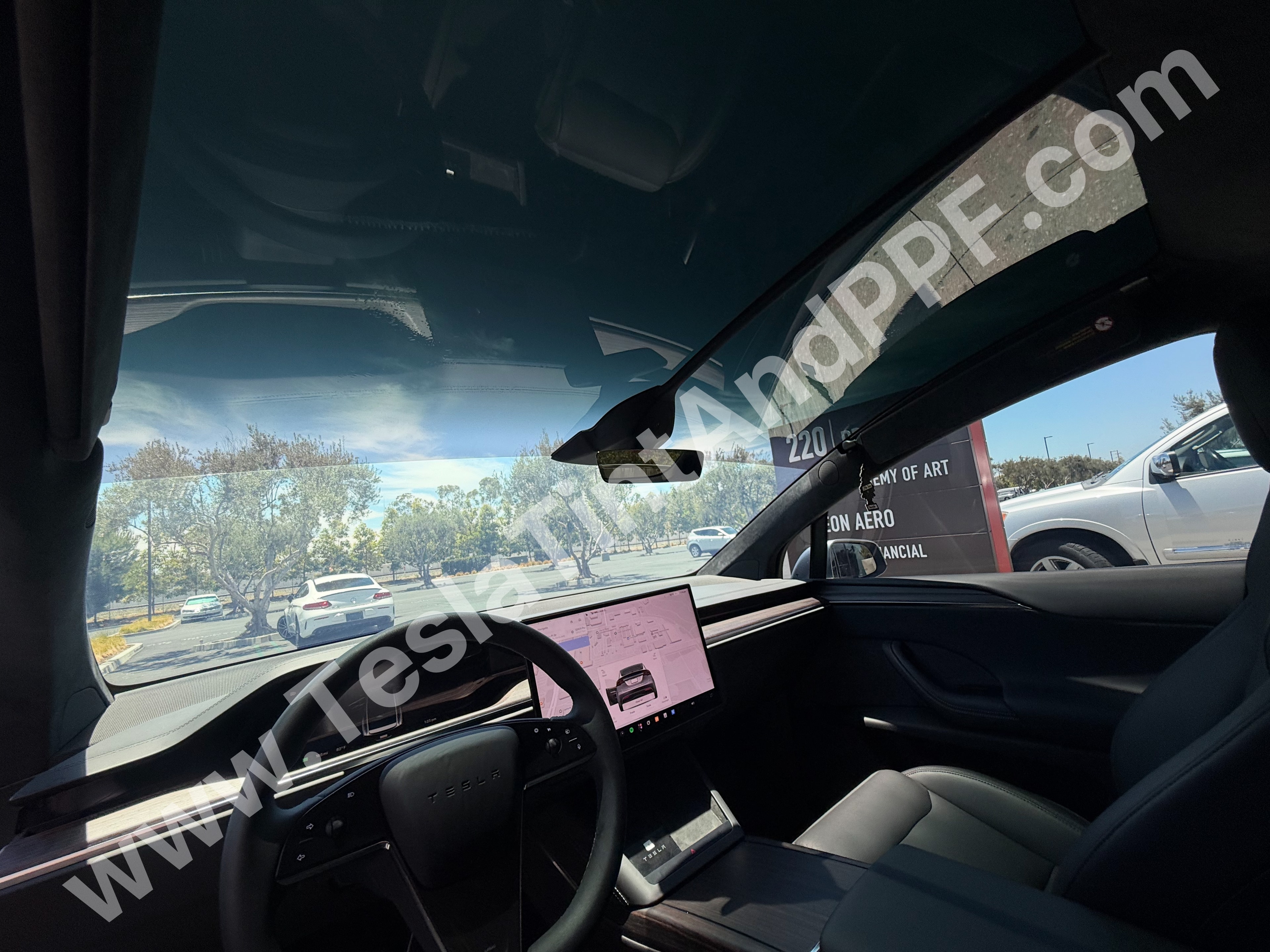 Car interior view through tinted window
